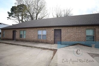 Building Photo - First month move in special $600!! Recently built 2 bed, 1 bath apartment - includes dishwasher a...