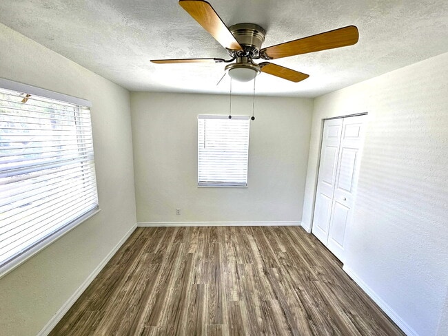 Building Photo - fully renovated 2-bedroom, 1-bathroom home with bonus guest room or office and oversized fenced yard