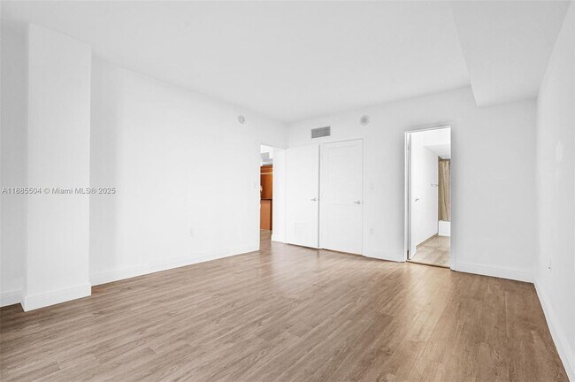 Building Photo - 10275 Collins Ave