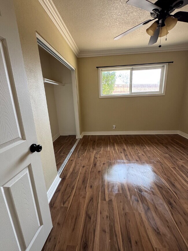 Building Photo - Large yard, spacious interior, extra parking and much more