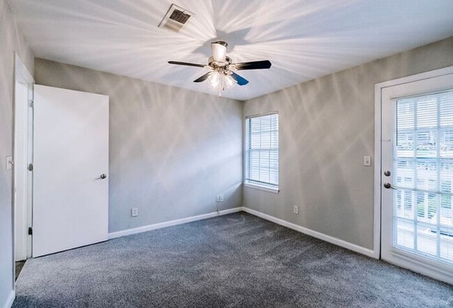 Building Photo - Spacious 2-Bedroom Elite Apartment with Private Balconies & Washer/Dryer
