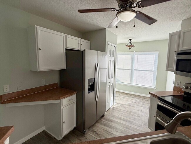 Building Photo - 3/2 Spacious Saint Cloud Home with fenced ...