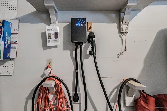 Electric car charger in garage - 9 Lupine Ct