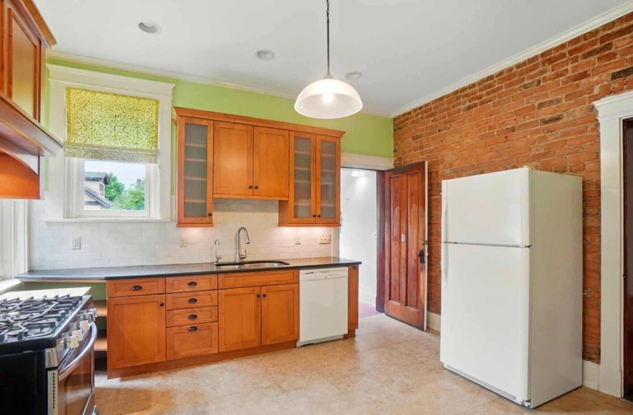 modern kitchen with granite counters - 513 Howell Ave