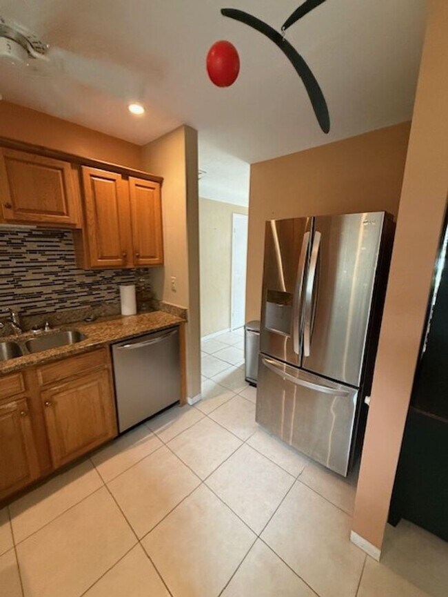 Building Photo - Well maintained 2/2 with a large yard in a...