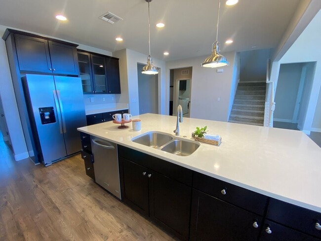 Building Photo - Advent -Immaculate Four Bedroom Home W/ Tw...