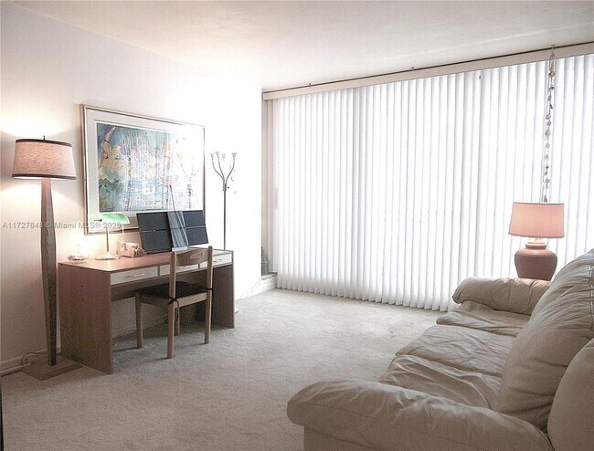 Building Photo - 5005 Collins Ave