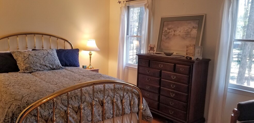 Downstairs Bedroom (option to have as primary) - 7 Steeple Chase Ct