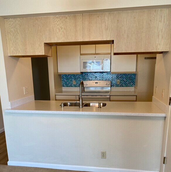 View of Chef’s kitchen from dining area - 445 Willow Ave