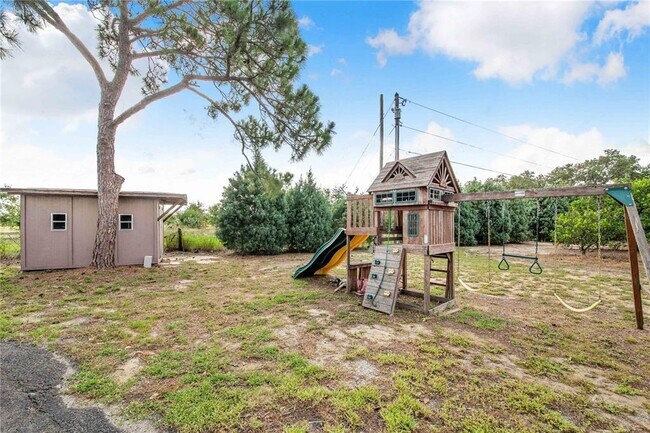 Building Photo - 7740 Lake Hatchineha Rd
