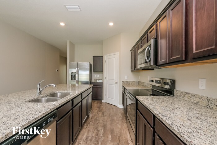 Building Photo - 5654 Alexander Springs Pl