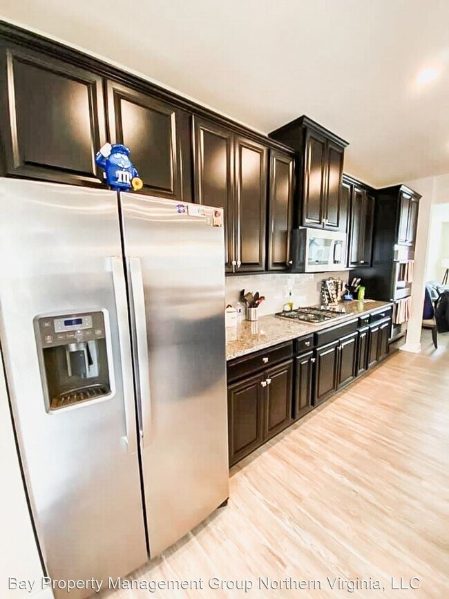 Building Photo - 4 br, 3.5 bath House - 7751 Blackburn Ridg...