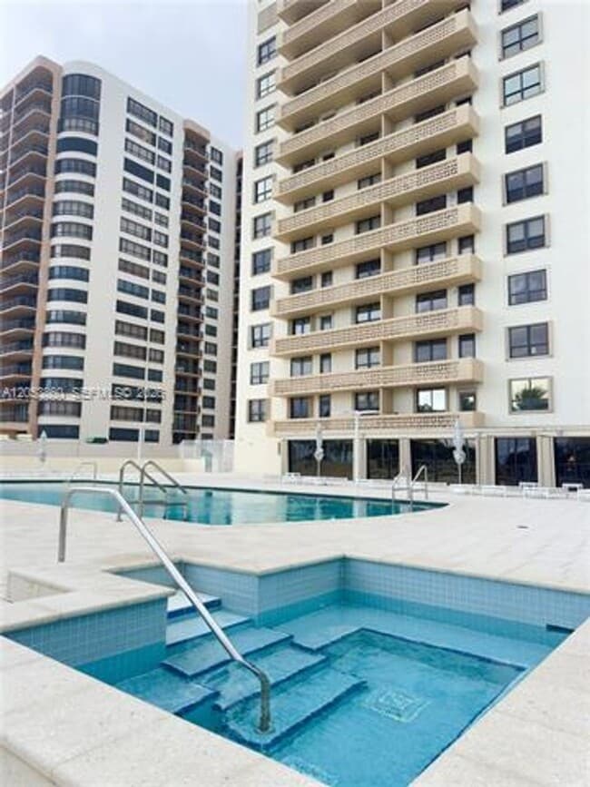 Building Photo - 10185 Collins Ave