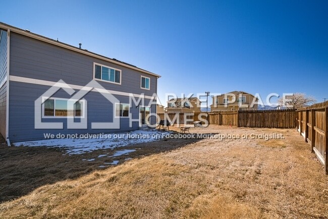 Building Photo - 9799 Desert Lily Cir