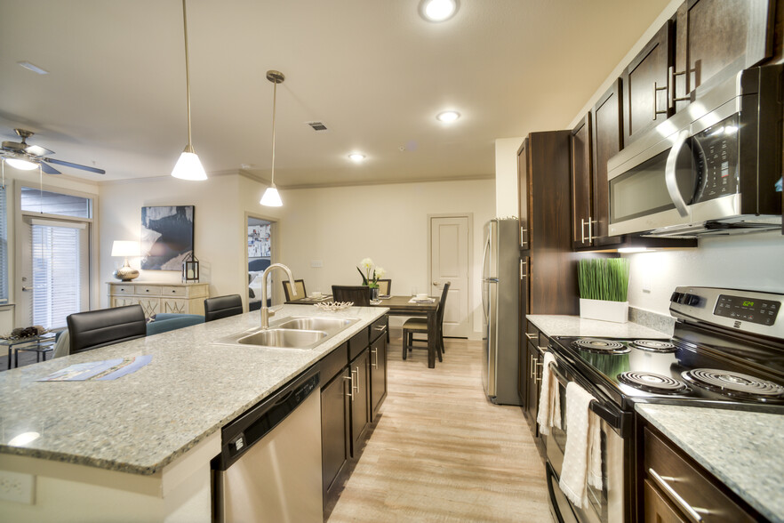 Spacious kitchen with plenty of cabinet space - Milwee Street Apartments