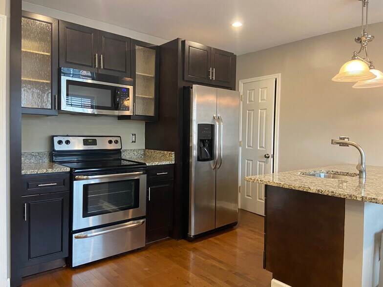 Kitchen with stainless steel appliances - 2576 Sherman Ave NW