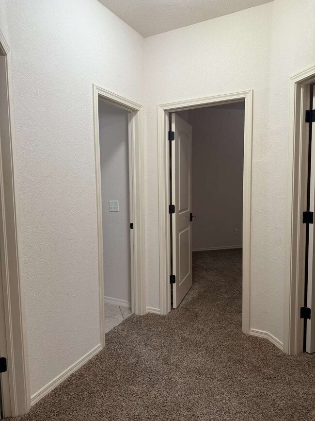 Building Photo - "Spacious 4-Bedroom Oasis with Granite Kit...
