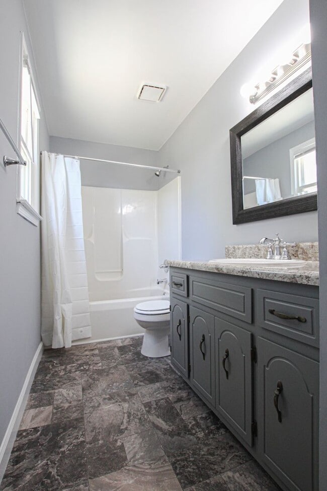 Building Photo - Pet Friendly Three Bedroom with Basement!