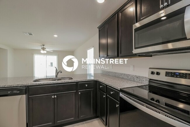 Building Photo - 4 Bedroom Pet-Friendly Home in Mascotte, FL with Main Street Renewal