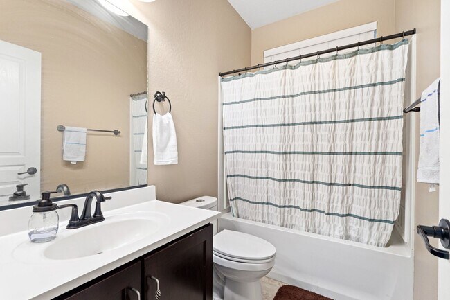 Building Photo - Welcome Home! This stunning 4 bedroom, 3 b...