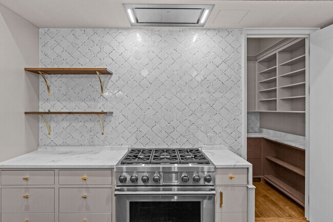 Building Photo - Rare opportunity to lease a luxury residence in The Nolen on Queens Road