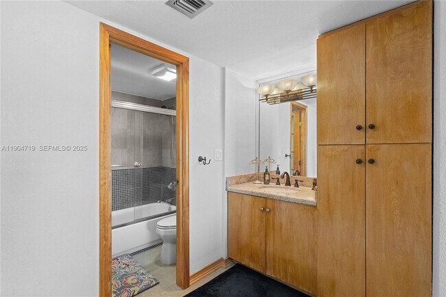 Building Photo - 3675 N Country Club Dr