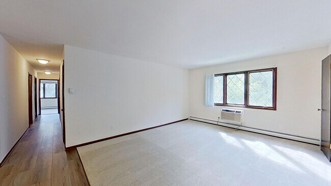 Building Photo - Renovated Upper 2 Bedroom 1.5 Bathroom Apartment is Available