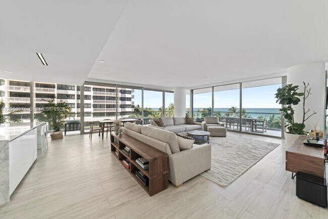 Building Photo - 10203 Collins Ave