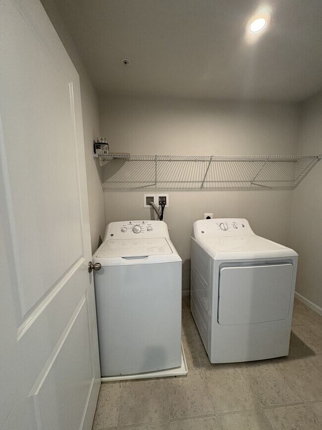 Building Photo - Stunning & Spacious Middle River 4bd/2.5ba Home with W/D, AC, Garage and more! Available now