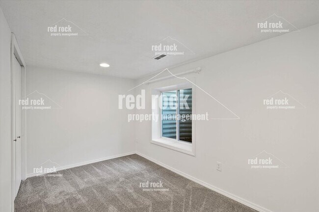 Building Photo - 2211 E 49th Ave