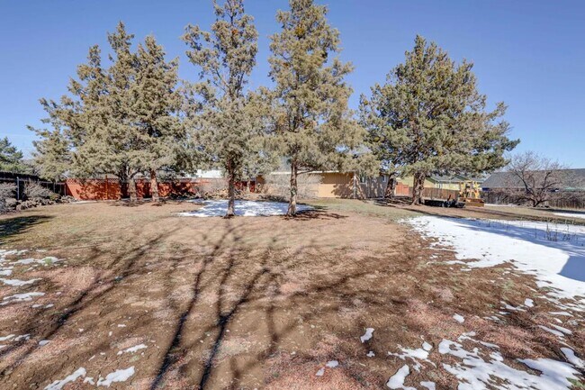 Building Photo - 1/2 acre in the with RV Hook ups