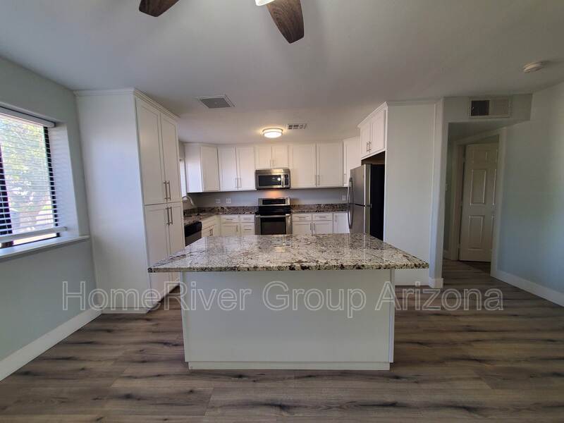 Building Photo - 4023 N 80th Dr