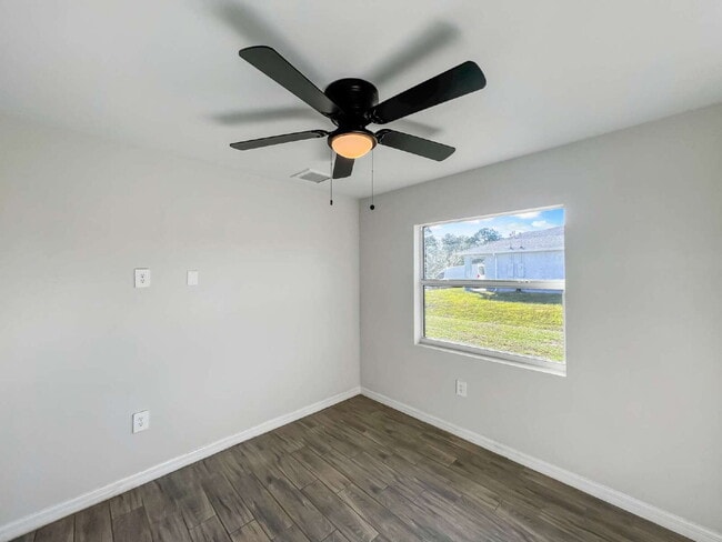 Building Photo - Move-In Special! Half Month FREE – APPLY by November 30th – Modern 3BR/2BA Duplex in Lehigh Acres...
