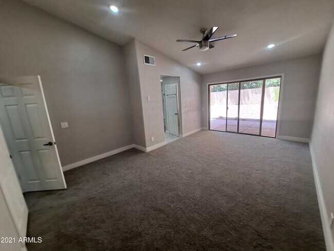 Building Photo - 9074 E Caribbean Ln