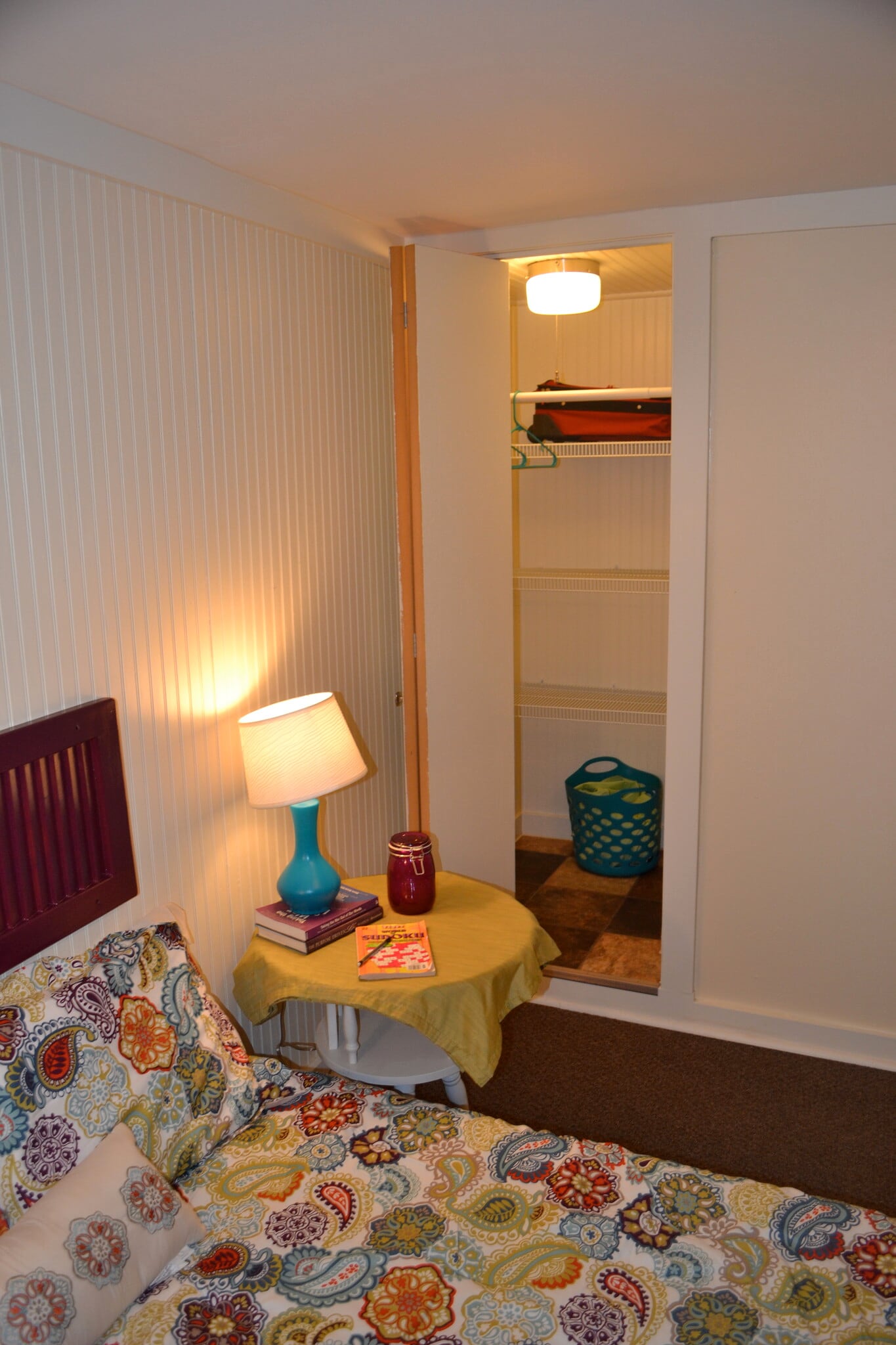 the closet has deep wire shelving behind the hanging rod - 222 W Case St