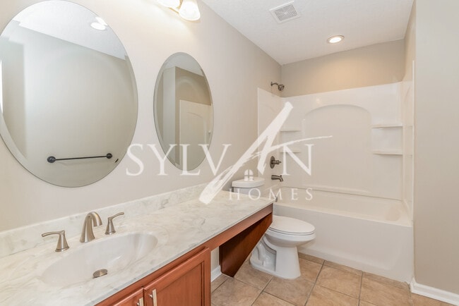 Building Photo - Lease today! No extra charge for contentme...