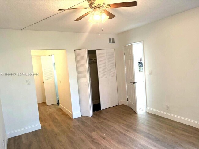 Building Photo - 5495 NW 10th Ct