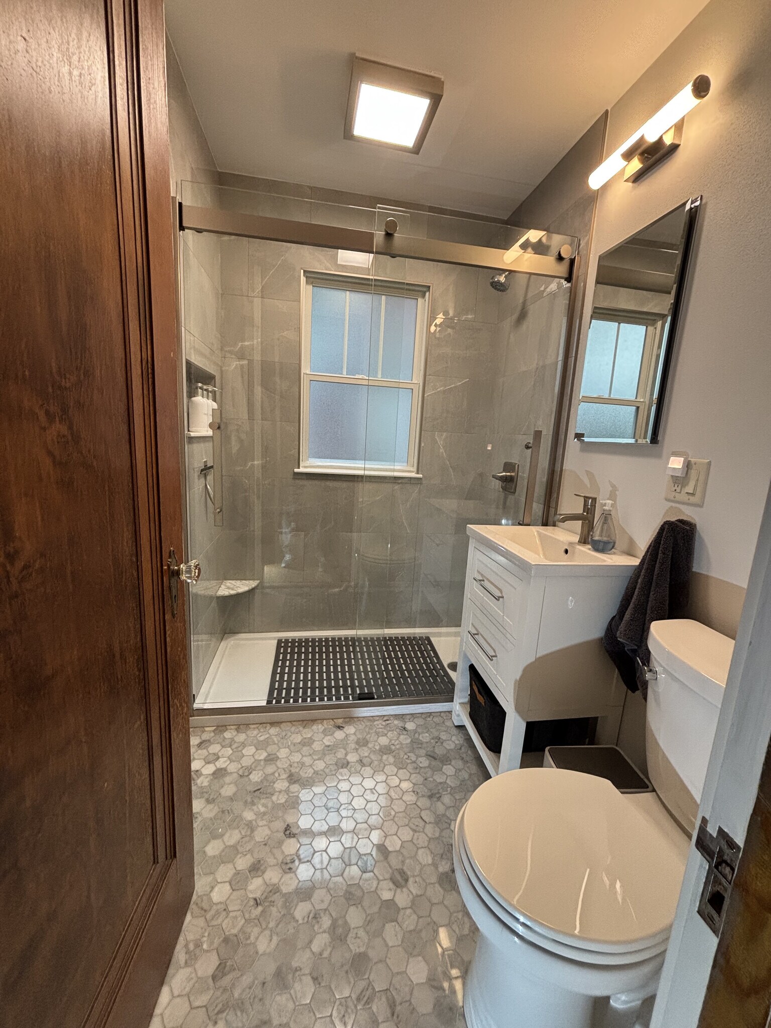 remodeled bathroom with walk in shower - 174 Dixon St