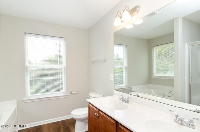 Building Photo - 6516 Rustling Leaves Way