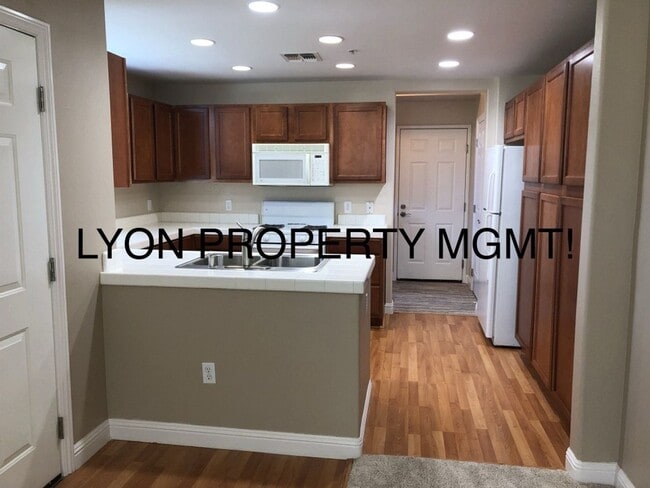 Building Photo - Fabulous condo located in the highly sough...