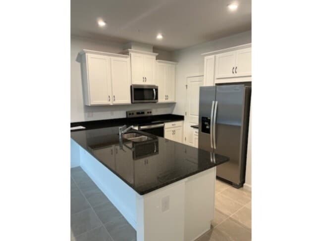 Building Photo - 3 bed 2.5 bath townhome at Gardenia Reserve