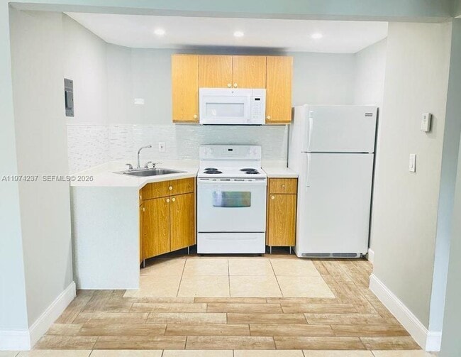 Building Photo - 4275 NW S Tamiami Canal Dr