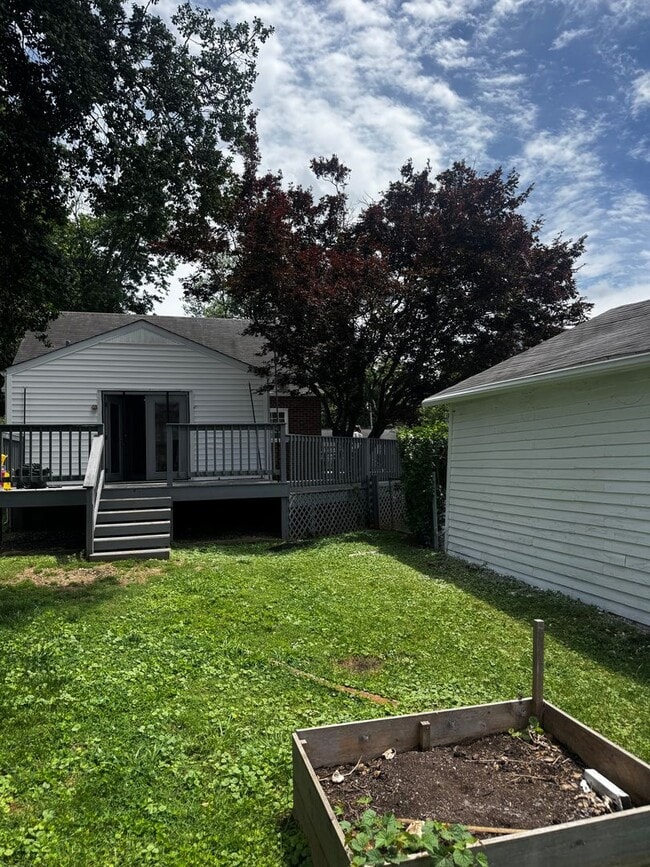 Building Photo - Fully Updated 3BR/2BA St. Matthews Cape Cod with Garage & Wrap-Around Deck