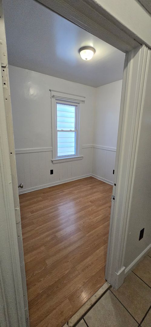 Building Photo - Large remodeled 4 bedroom with off street parking available