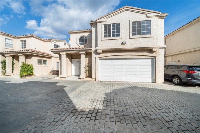 Primary Photo - Spacious 4-Bedroom Home in Gated Reseda Co...