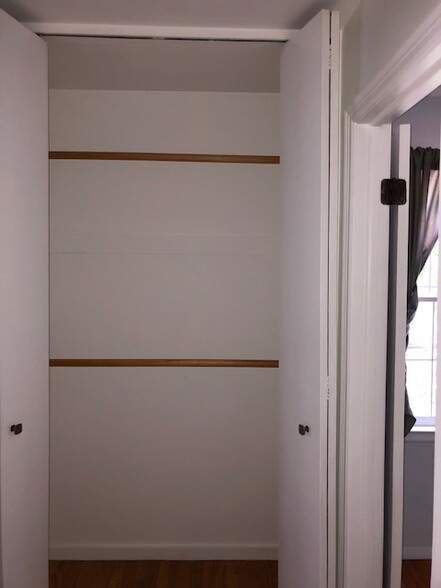 1 of 2 hallway closets - 80 Brush Hill Ave