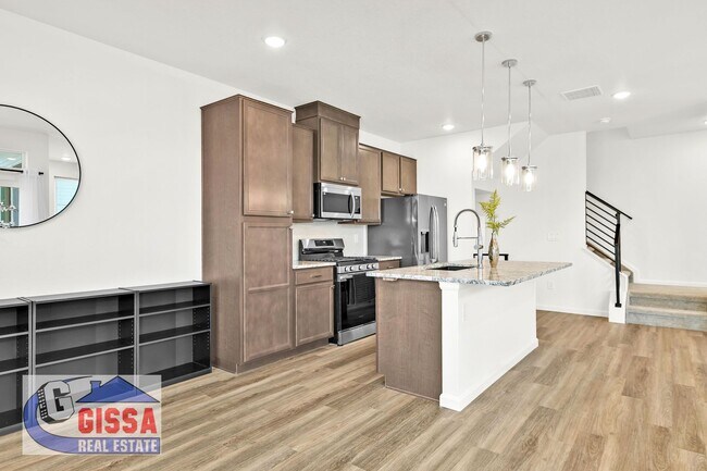 Building Photo - 1.5 year old townhome with 3 bedrooms, 2 1/2 bathrooms, 2-car garage at Victory Ridge available NOW!