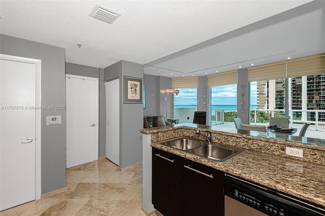 Building Photo - 6515 Collins Ave