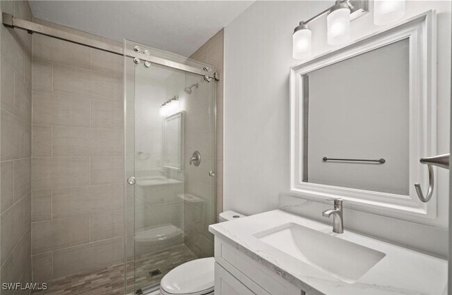Building Photo - 7056 Pelican Bay Blvd