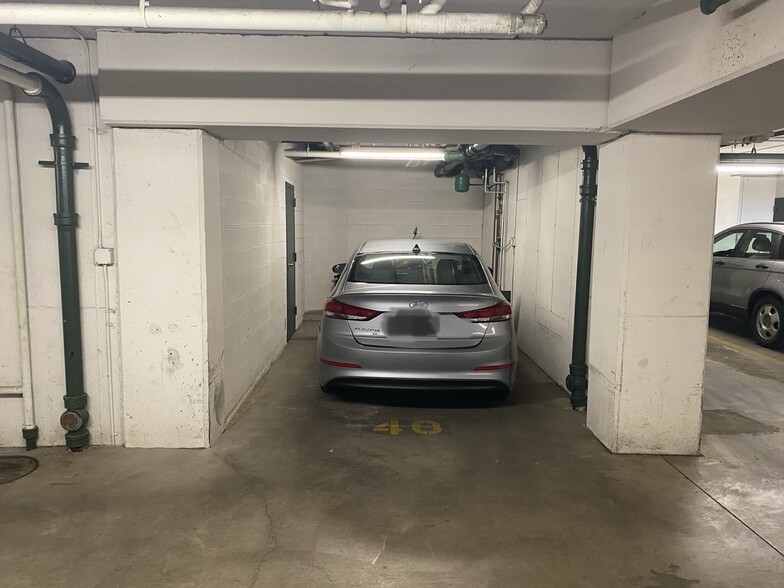 Semi-enclosed garage space - 6400 W Berteau Ave